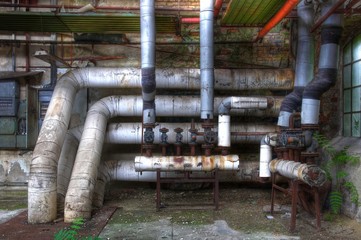 Wall Mural - Old pipes with valves