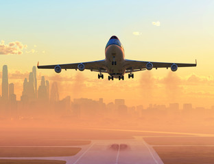 Wall Mural - airplane taking off at sunrise
