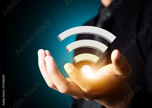 Fotografía Símbolo tecnología wifi empresario en la mano