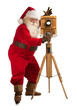 © Milles Studio - Santa Claus taking picture with old wooden camera