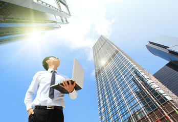 Poster - business man with laptop and look sky and cloud