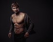 © MaxFrost - Young handsome macho man with muscle abdominal and open jacket
