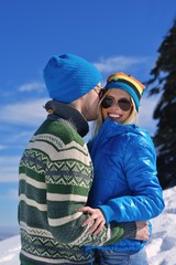 Wall Mural - Young Couple In Winter  Snow Scene