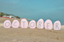 October, Tenth Month Of The Year On Pink Stones