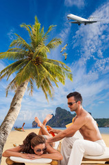 Wall Mural - Couple on the tropical beach