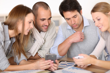 Aufkleber - Business meeting around table with electronic devices