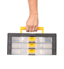 Man hand holding plastic tool box.