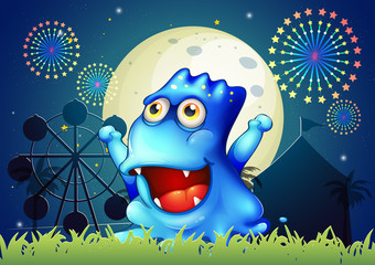 Canvas Print - A blue monster strolling at the carnival in the middle of the ni