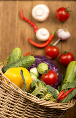 Wall Mural - Healthy Organic Vegetables on a Wooden Background. Frame Design