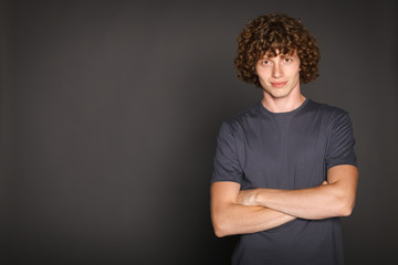 Wall Mural - Redheaded man in casual with folded hands