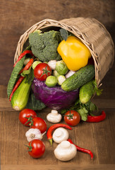 Wall Mural - Healthy Organic Vegetables on a Wooden Background. Frame Design