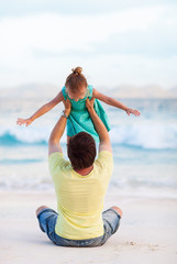 Father and daughter at beach