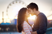 Romantic Couple In Front Of Santa Monica Amusement Park
