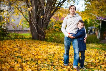 Sticker - Father and son outdoors at autumn day