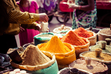 Poster - Traditional spices and dry fruits in local bazaar in India.