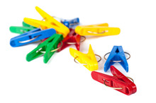 Closeup Image Of Colorful Clothespins On A White Background