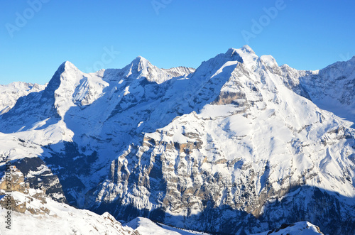 Board z aluminiowym obramowaniem Eiger, Moench i Jungfrau, słynne szwajcarskie szczyty górskie