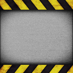 Warning stripes background with rusty plate