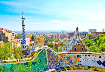 The Famous Summer Park Guell over bright blue sky in Barcelona