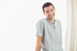 © WavebreakMediaMicro - Casual cheerful man looking at camera