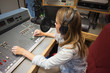 © WavebreakmediaMicro - Concentrating pretty radio host moderating