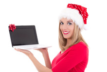 Happy Woman In Santa Hat Buying Presents By Internet