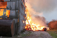 Burning Farm Building With Hay