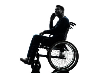 Wall Mural - handicapped man on the telephone in wheelchair silhouette