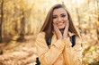 © gpointstudio - Portrait of young happy woman during the autumn hiking
