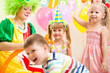 © Oksana Kuzmina - jolly kids group and clown on birthday party