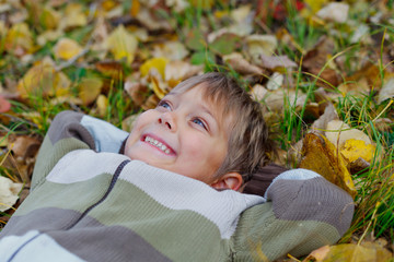 Wall Mural - Boy in a autumn park