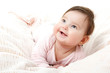 © Khorzhevska - cute funny infant baby looking up in left corner and happy smili