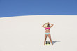 © roboriginal - Active retired woman on beach sand dune