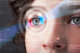 Fototapeta  - Cyber woman with technolgy eye looking
