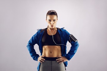 Wall Mural - Attractive young woman in sportswear