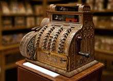 Old-time Cash Register In A Shop.