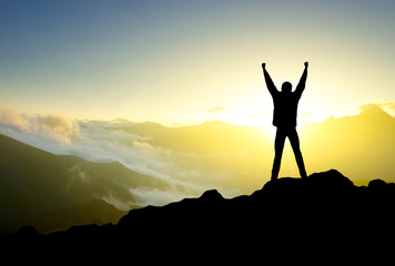 Wall Mural - tourist on the mountain top. sport and active life concept