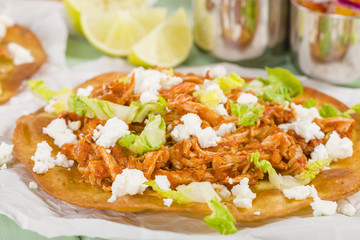 Tostadas - Mexican crispy tortilla with chicken tinga and cotija