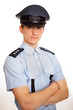 © petrdlouhy - Portrait of young policeman on white background.