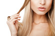 © julenochek - Woman with long straight blond hairs isolated