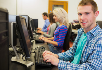 Wall Mural - Students using computers in the computer room