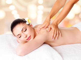 Wall Mural - woman having massage of body in spa salon