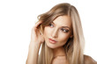 © julenochek - Woman with long straight blond hairs isolated