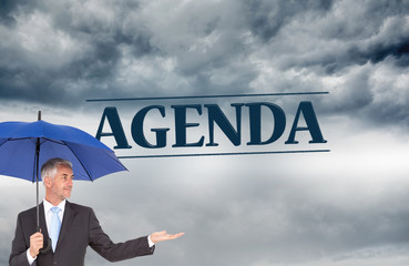 Poster - Composite image of happy businessman holding umbrella