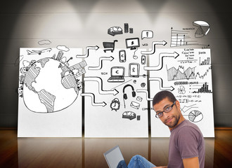 Poster - Composite image of man wearing glasses sitting on floor using la