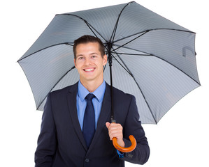 Wall Mural - young business executive holding umbrella