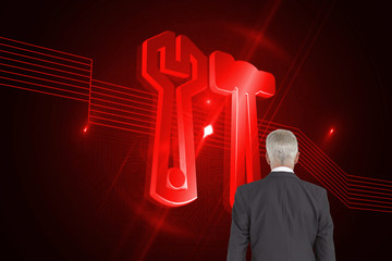 Poster - Composite image of businessman walking away from camera
