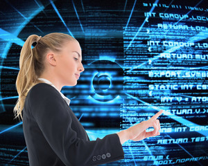 Poster - Composite image of businesswoman pointing somewhere