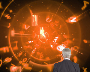 Poster - Composite image of businessman walking away from camera