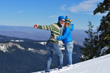 Wall Mural - young couple on winter vacation